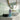 Nordic Freezz bottle and microfibre cloths laid out in a green-tiled bathroom, the complete starter kit